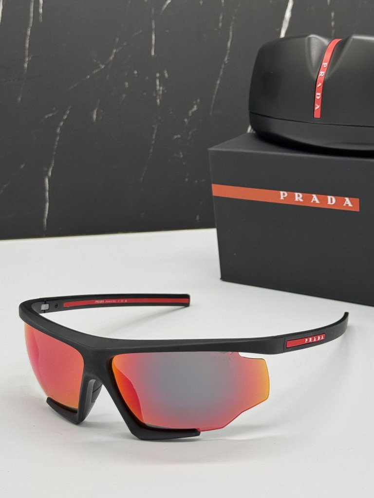 Prada Black Sunglasses With Red Mirrored Lenses